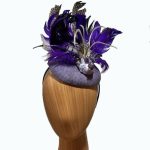 purple bird feathered fascinator