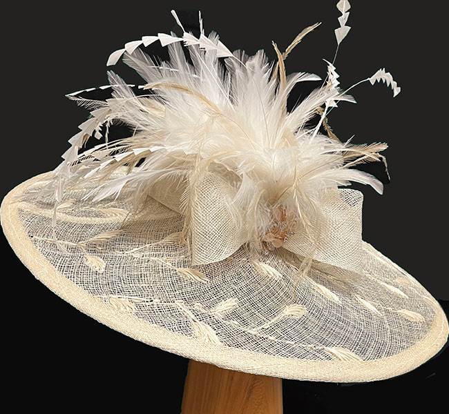 ivory embroidered feathered hat