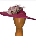 Claret orchid fascinator hat